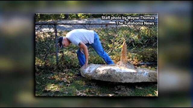 Man unearths wooden coffin in backyard